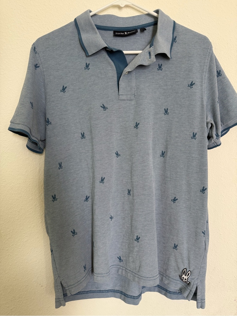 Psycho Bunny Blue Polo with Navy Bunny Motifs